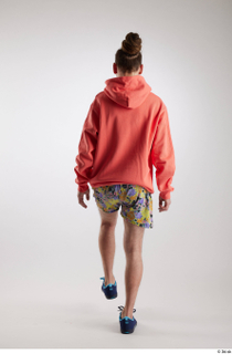 Nigel 1 back view blue sneakers dressed floral printed shorts…